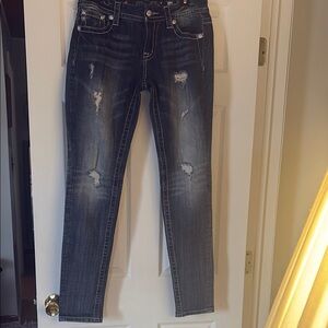 Stylish Distressed mid rise dark blue skinny Miss Me embellished pocket jeans